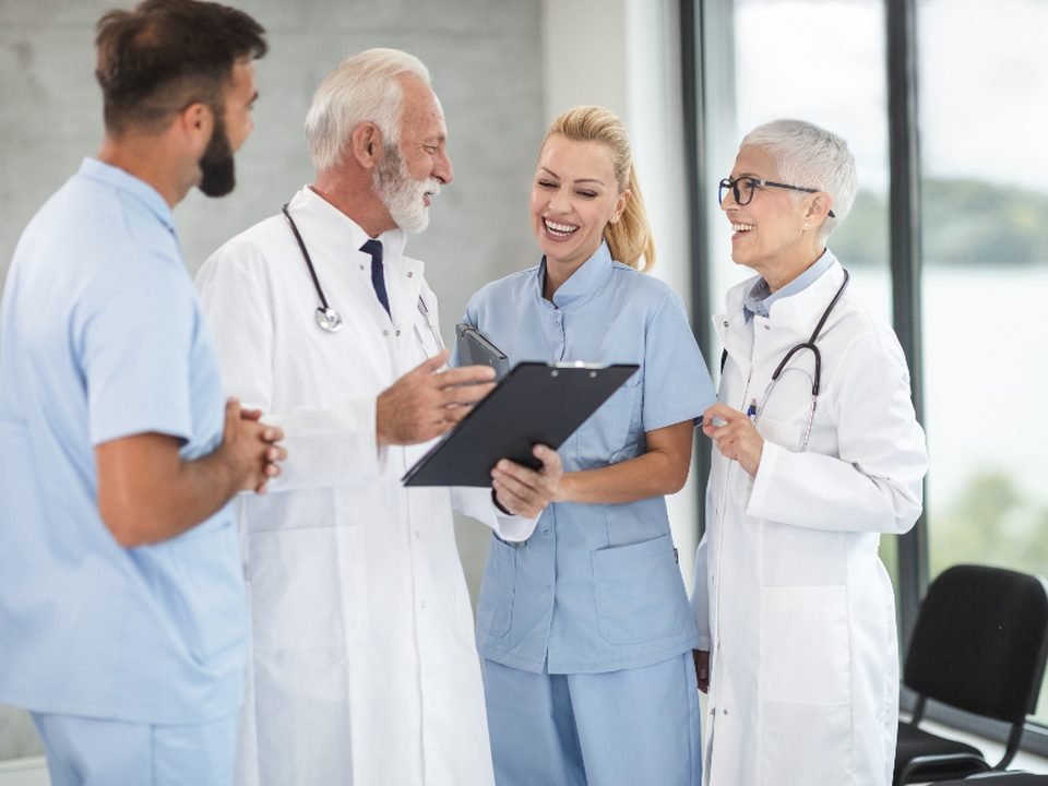 Clinicians reviewing a patient chart together